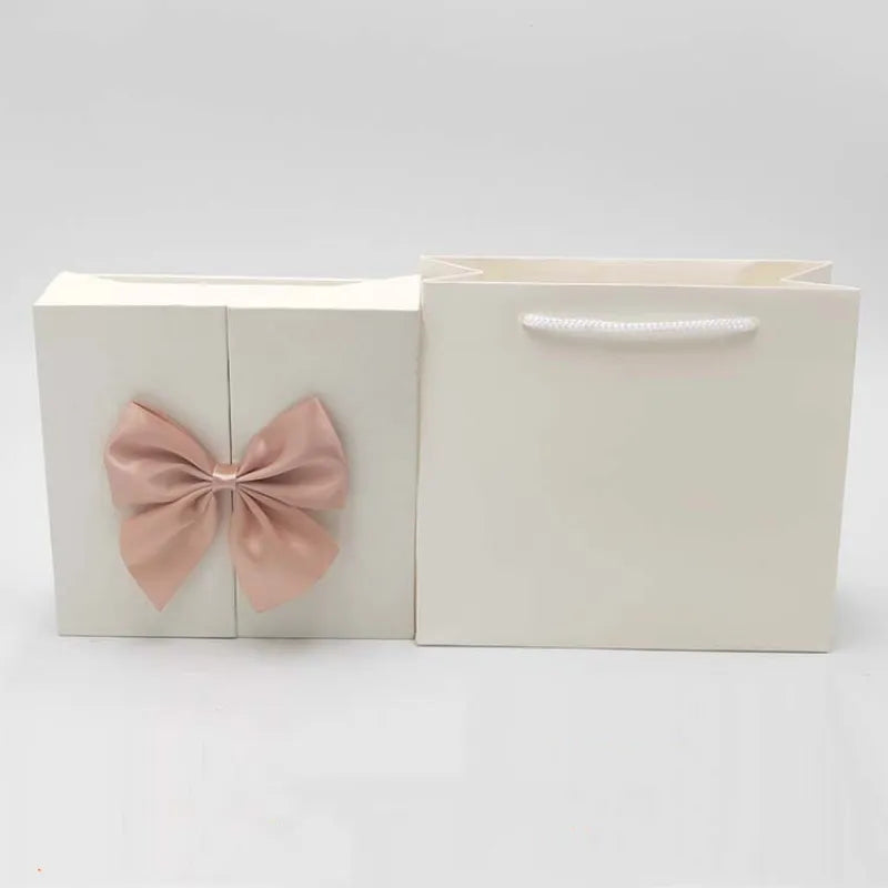 Rose jewelry box open showing velvet holder and roses