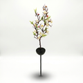 Solar cherry blossom garden stake light on white background