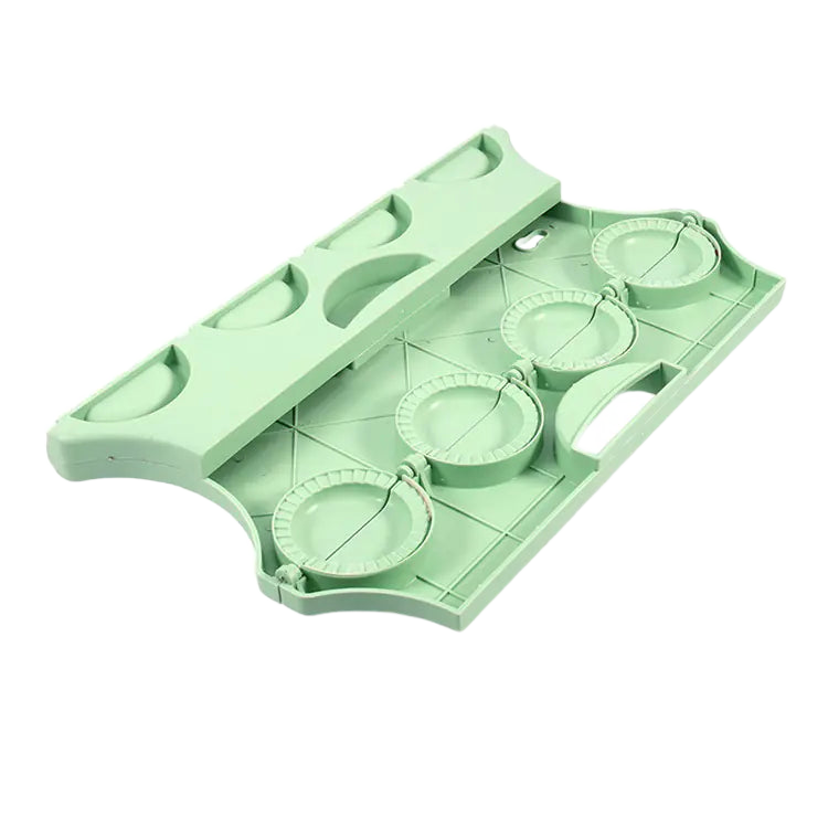 Snagly Dumpling Maker press on pure white background, square ecommerce packshot