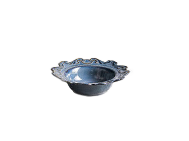 Baroque blue-silver porcelain bowl with ornate scalloped rim on white background